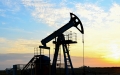 pumpjack with sunrise background