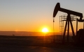 pumpjack with sunset in the background