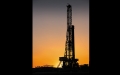 drilling rig at sunset