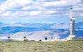 drilling rig and mountains