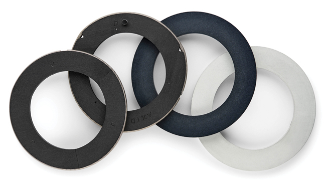 Compressor rings made from different materials