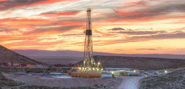 drilling rig at sunset