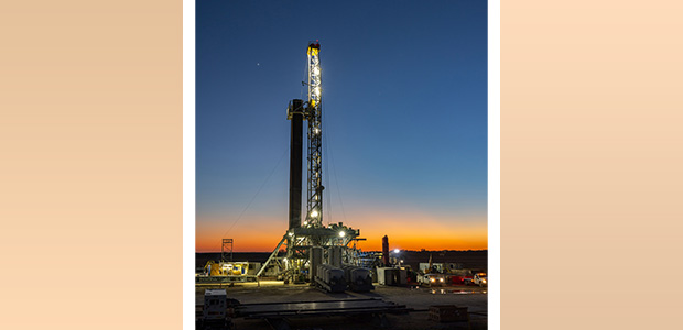 Eagle Ford drilling rig at sunset