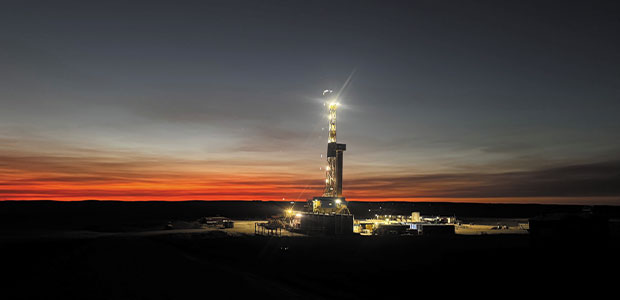 drilling rig at sunset