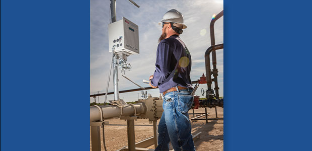 man looking at field equipment