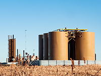 Tank battery and oil treater