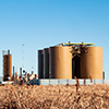 Tank battery and oil treater