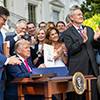 Trump Signing the Bill