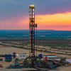 rigs at sunset
