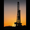 drilling rig at sunset