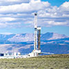 drilling rig and mountains